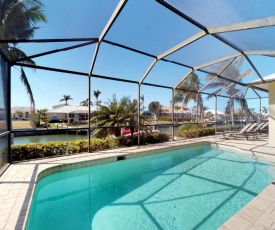 Waterfront 3 Bed Plus Den 3 Bath Home,Heated Pool w/ Large Screened-In Lanai!