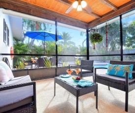 Villa Paradiso near PGA Blvd with a large pool and screened porch